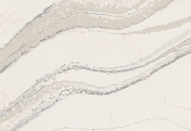 White countertop with gray, wavy veining.