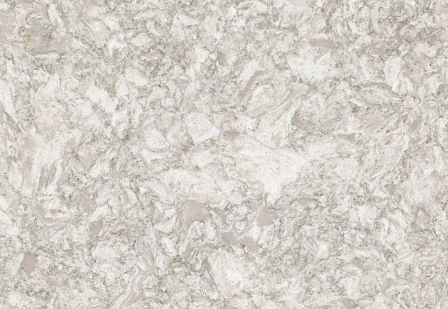 Light-colored countertop surface with white and gray mottled crystalline pattern.