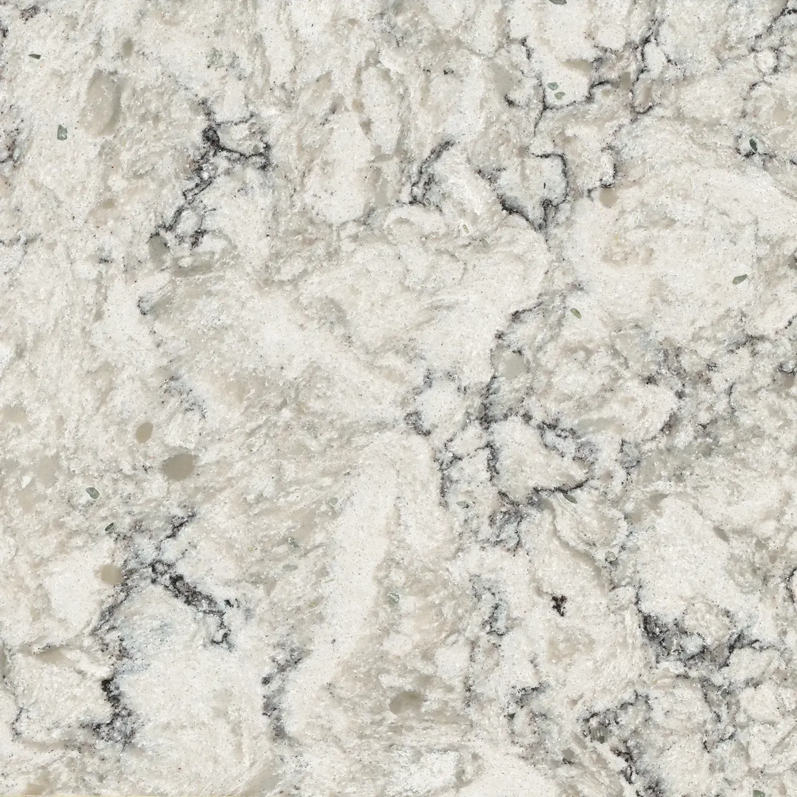 White countertop with gray and black veining.