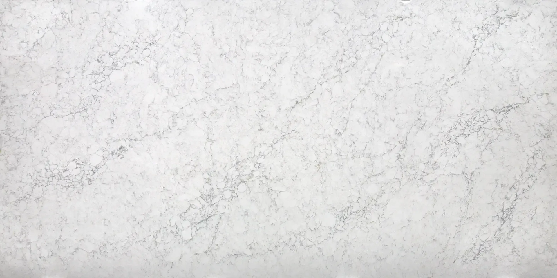 White marble surface with gray veining.