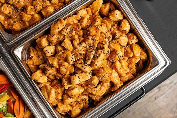 A close up of a tray of food on a table.