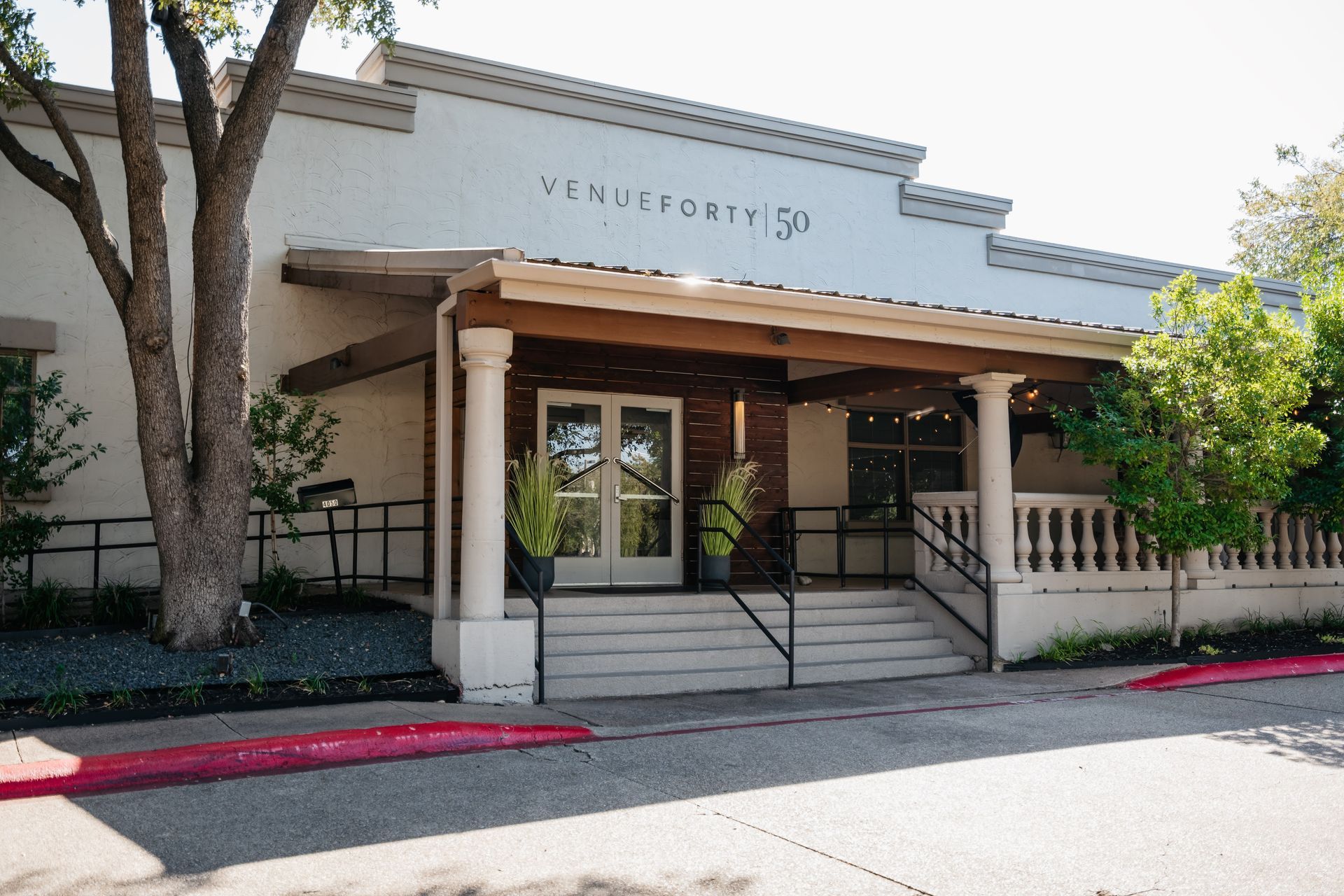 A white building with the word venue on it