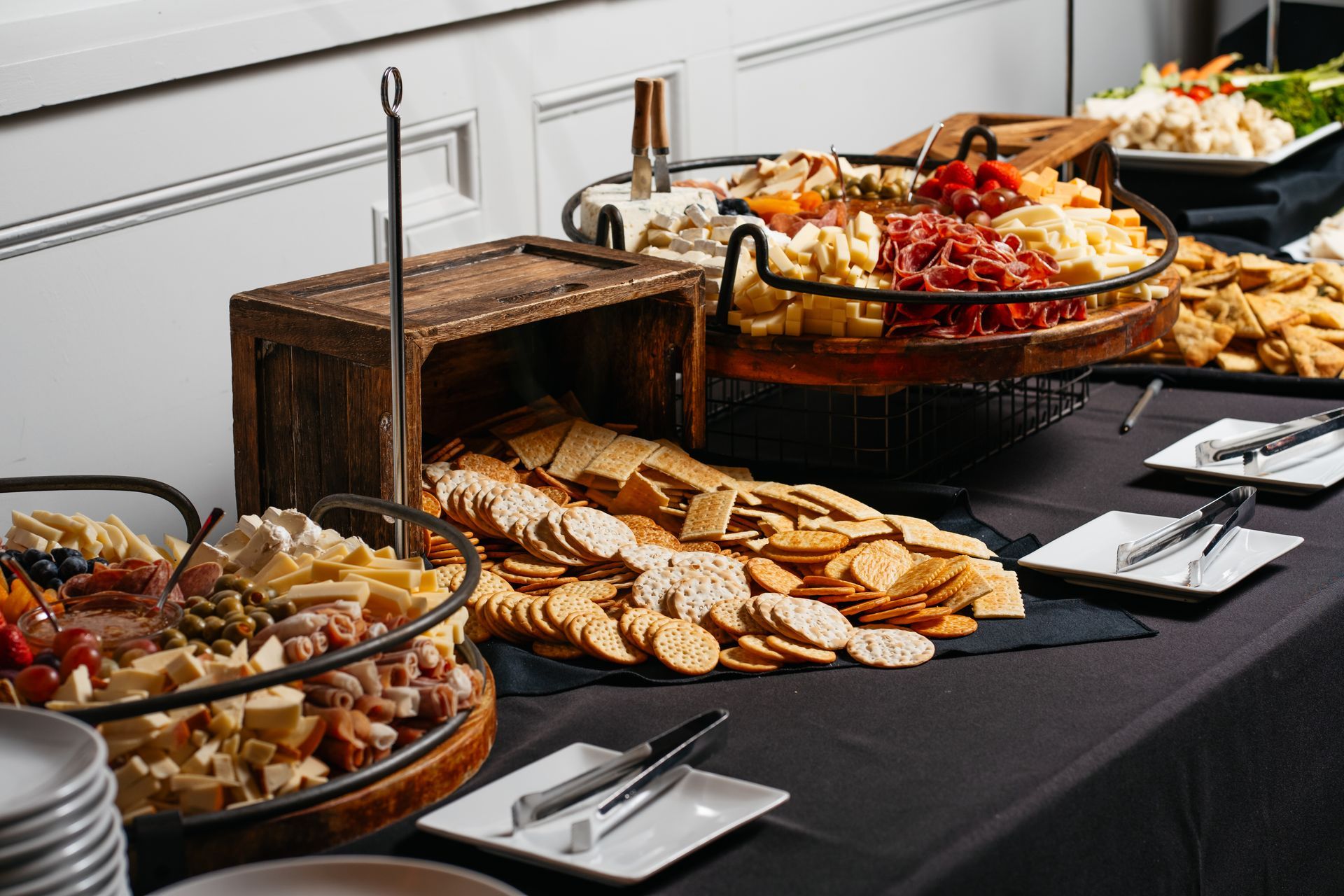 A buffet table with a variety of food on it
