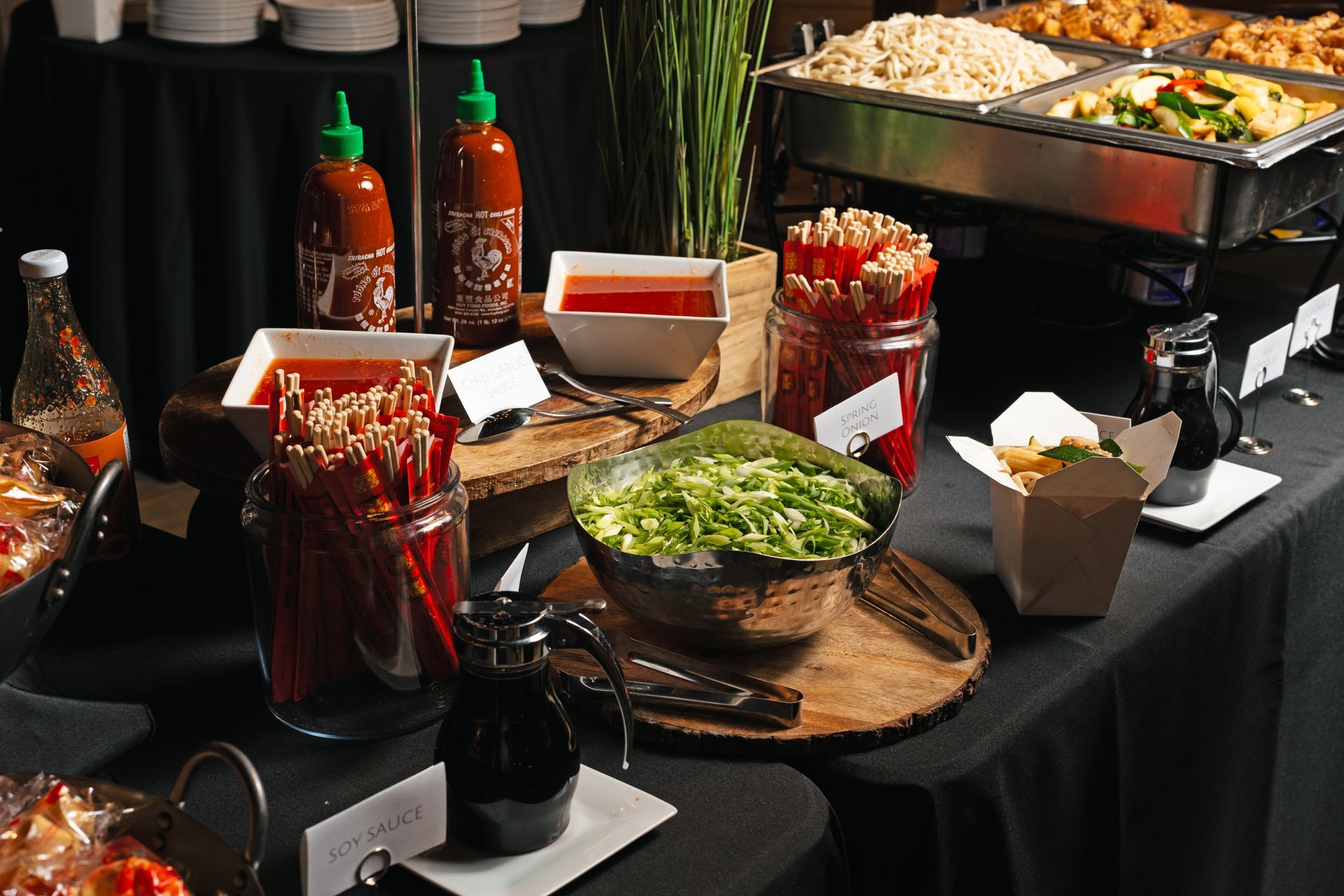 A buffet table with a lot of food on it