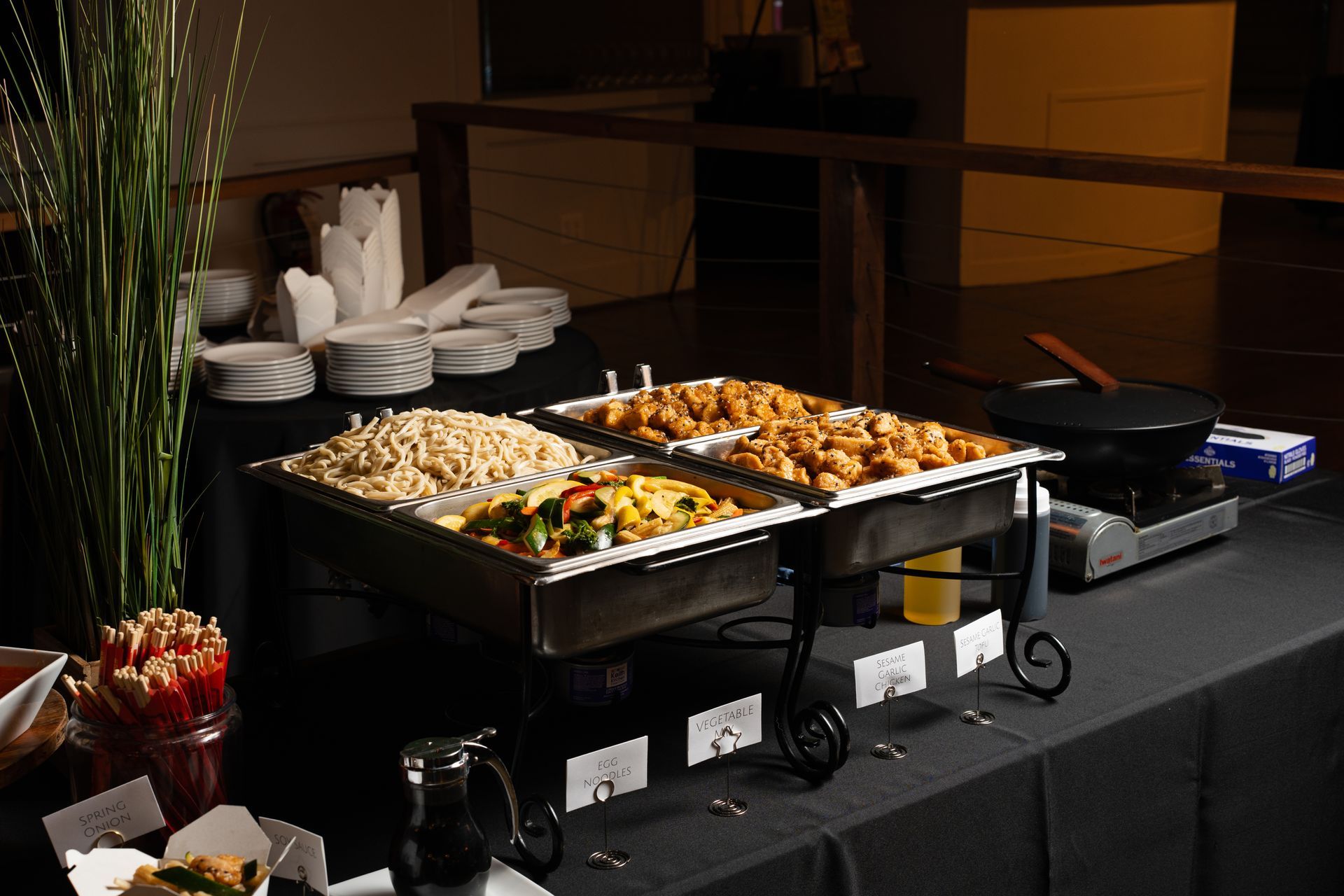 A buffet table with a variety of food on it
