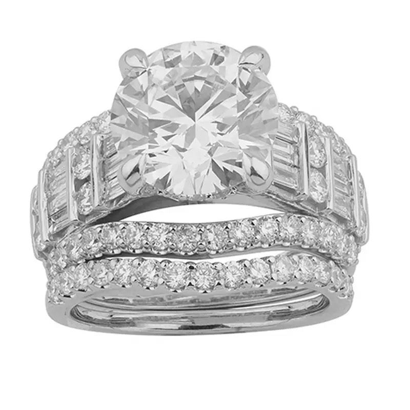 Diamond engagement ring set with a large round center stone and two pavé diamond bands