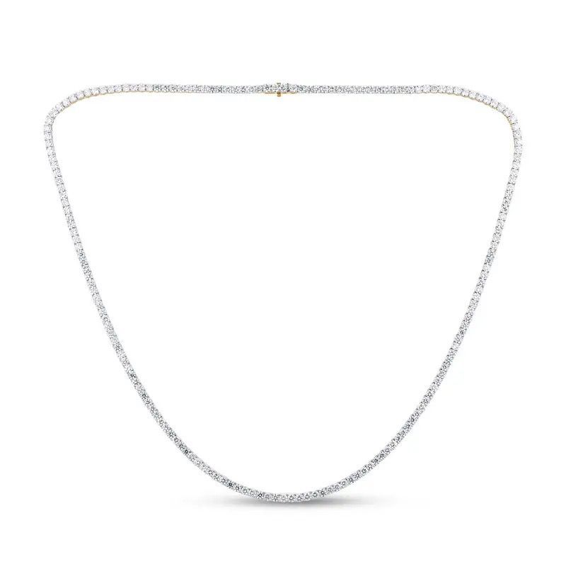 Delicate silver chain necklace with a small clasp on a white background