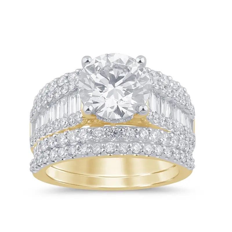 Platinum and yellow gold diamond ring with a large round center stone and pavé band