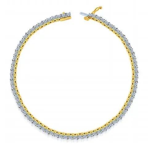 Gold and silver hoop bracelet with a clasp on a white background