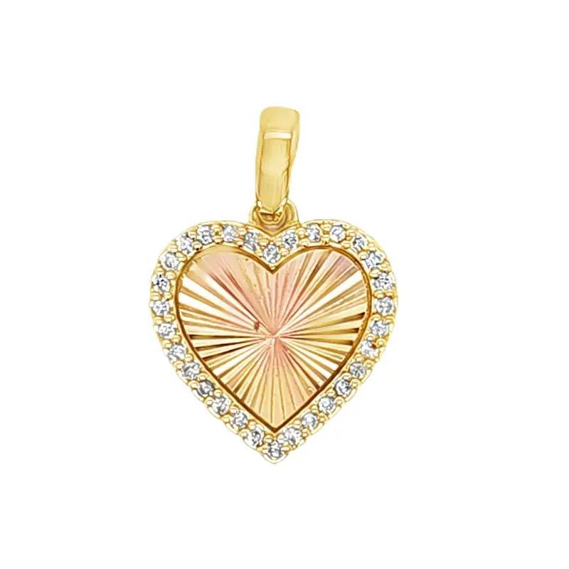 Gold heart-shaped pendant with a diamond border and radiant engraved center