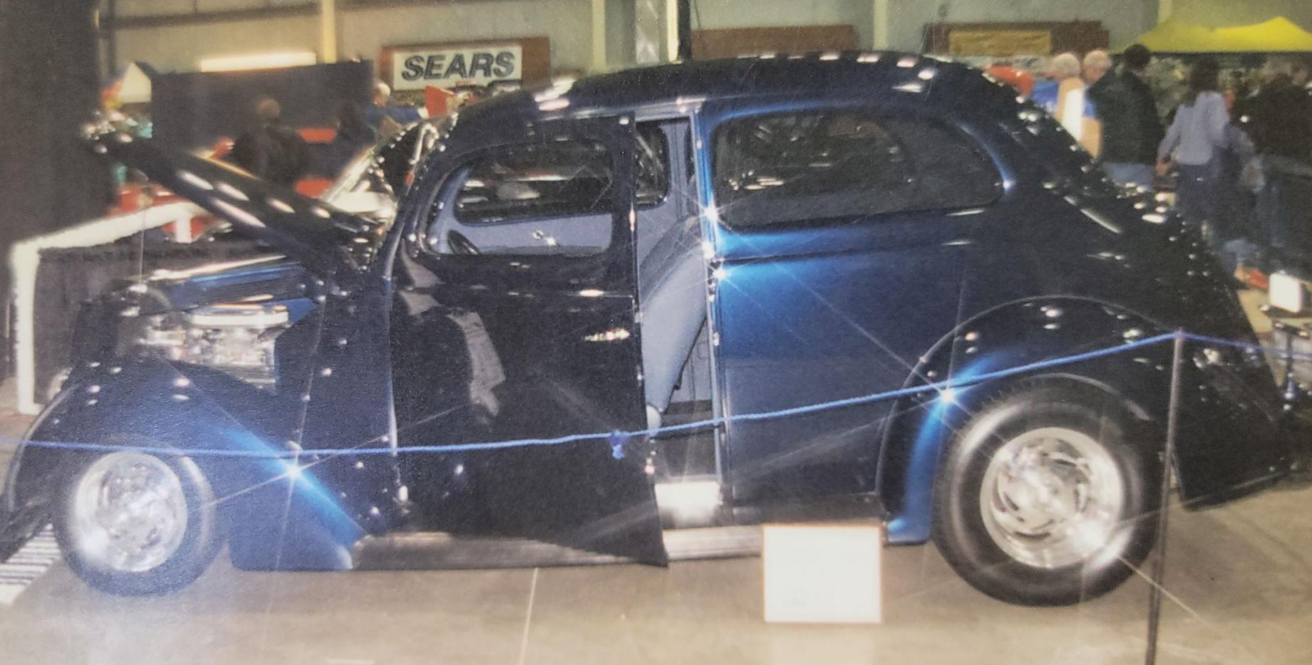 Side view of a blue vintage car