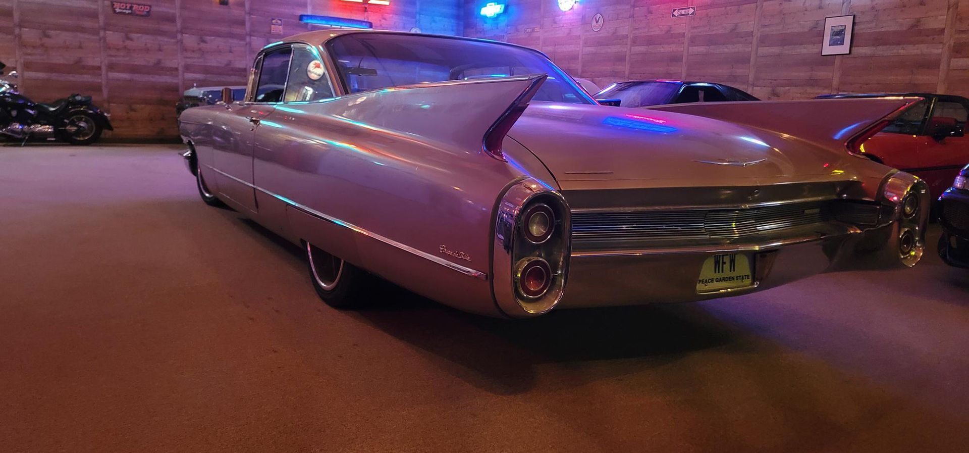 Back side view of a brown vintage car