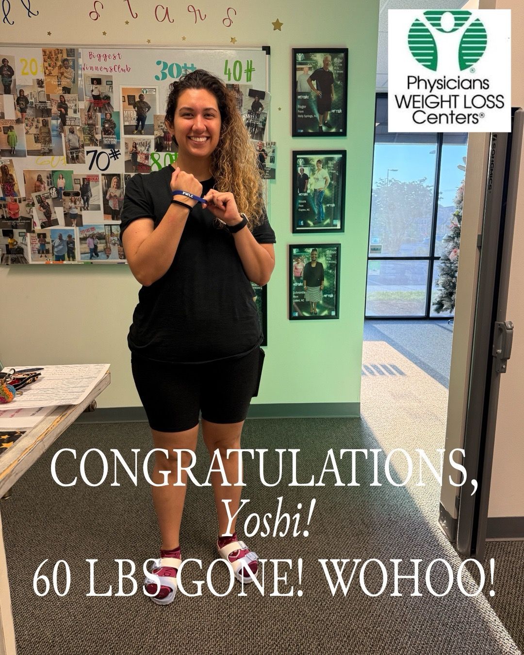 Woman in black shorts and shirt smiles, celebrating 60 lbs weight loss. 