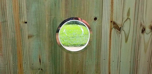 Wood fence dog window