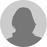 Silhouette of a person, head and shoulders, in a grey circle.