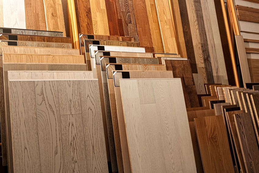 Various wood flooring samples in different colors and textures.