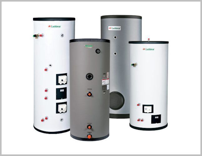 Four cylindrical electric water heaters with white and gray finishes stand against a plain white background.