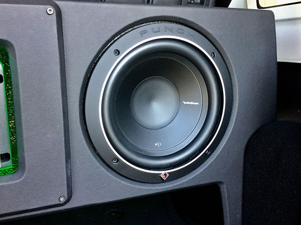 Black Rockford Fosgate Punch subwoofer mounted in a custom car audio enclosure.