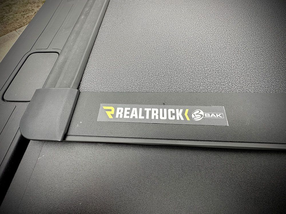 Black truck bed cover with 