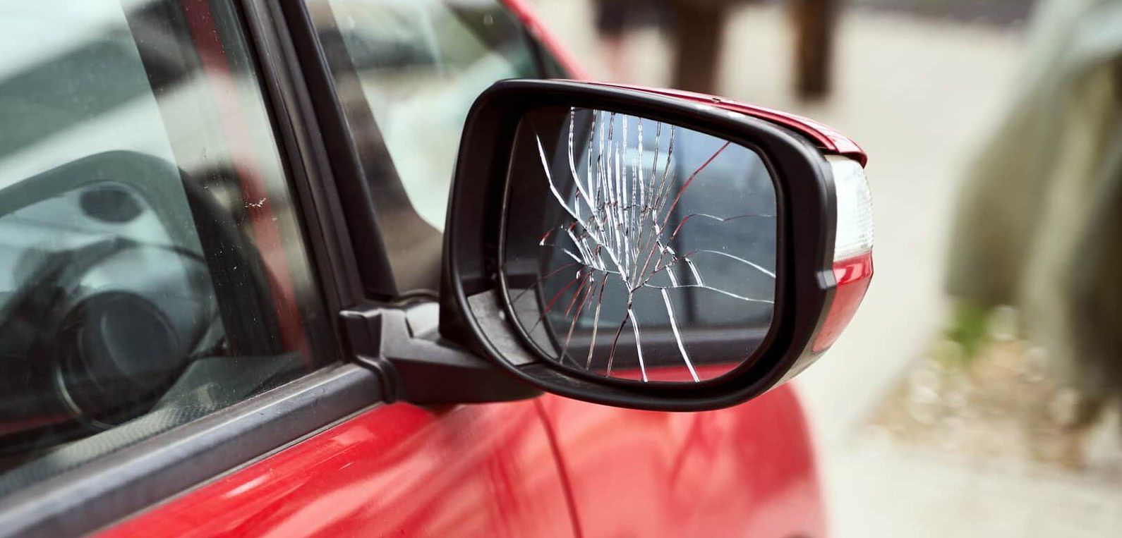 a broken side-view mirror