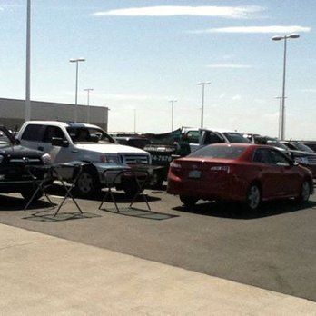 A lot of cars are parked in a parking lot