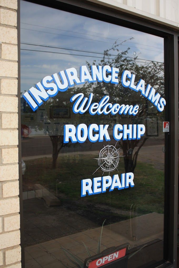 A window that says insurance claims welcome rock chip repair