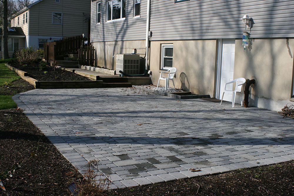 A house with a patio in front of it