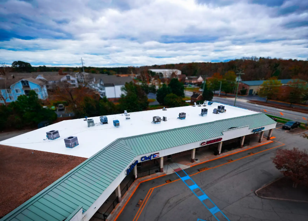 An aerial view of a building roof, showcasing its structure and design from above.