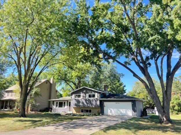 After - The trees are trimmed in front of a house