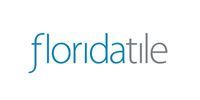 A blue and white logo for floridatile on a white background.