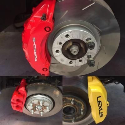 Two car brake rotors with red and yellow performance calipers, shown in a side-by-side comparison.