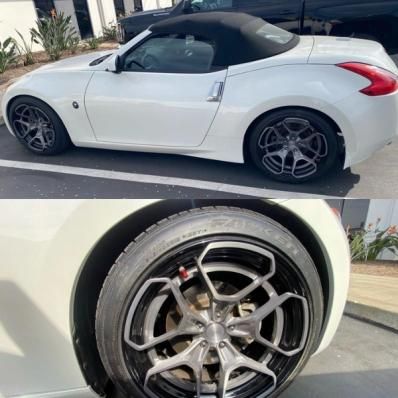 White sports car with black soft top, shown from the side and a close-up of a custom wheel and tire