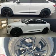 White sports SUV shown in side views with black rims, plus a close-up of the alloy wheel