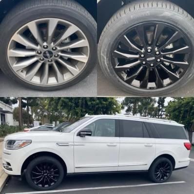 White SUV with black wheels shown in side view, with a close-up of two wheel styles above it