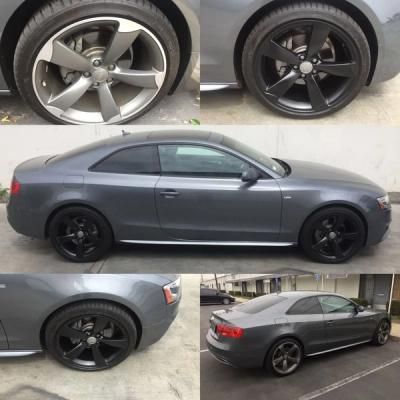 Gray two-door coupe with black rims shown from multiple angles, including close-ups of the wheels.