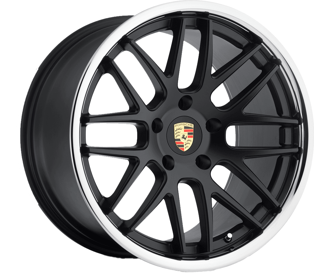 Black Porsche alloy wheel rim with multi-spoke design and Porsche crest center cap