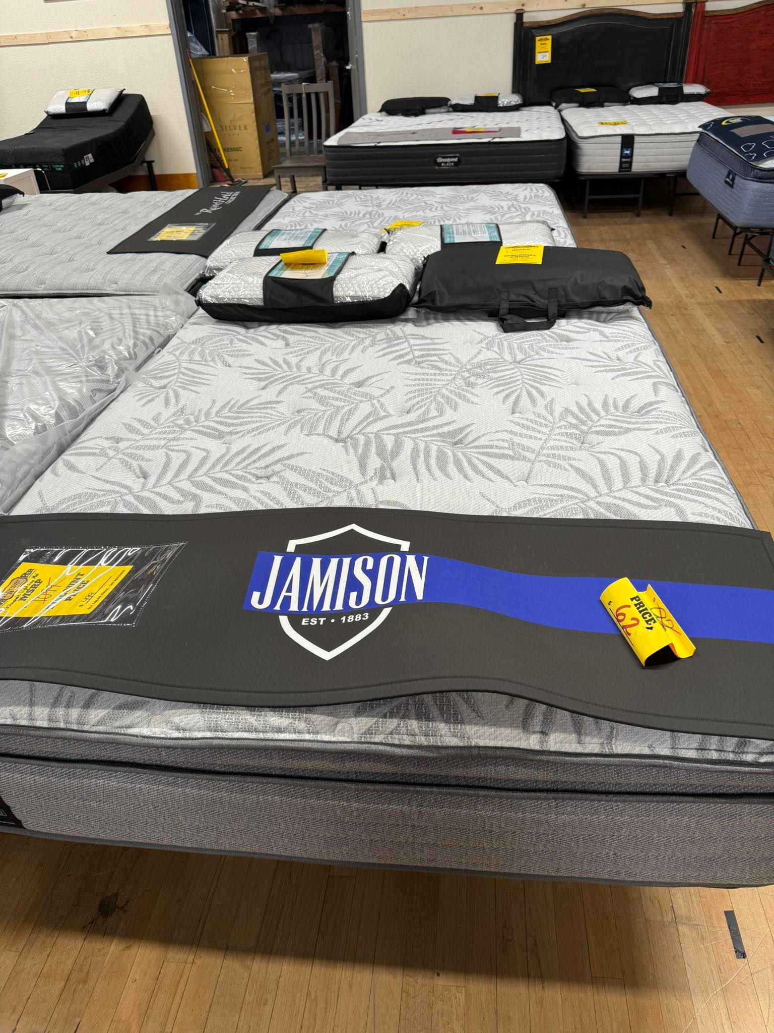 Mattresses on display in a store, featuring a 