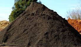 a pile of dirt is sitting on top of a pile of dirt