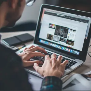 Person using laptop to search