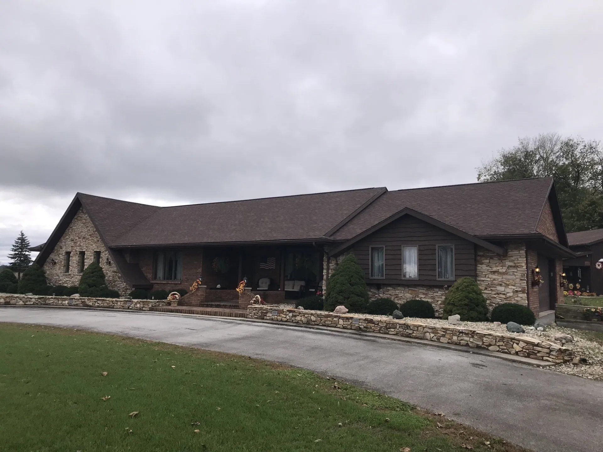 Huge house with asphalt roofing