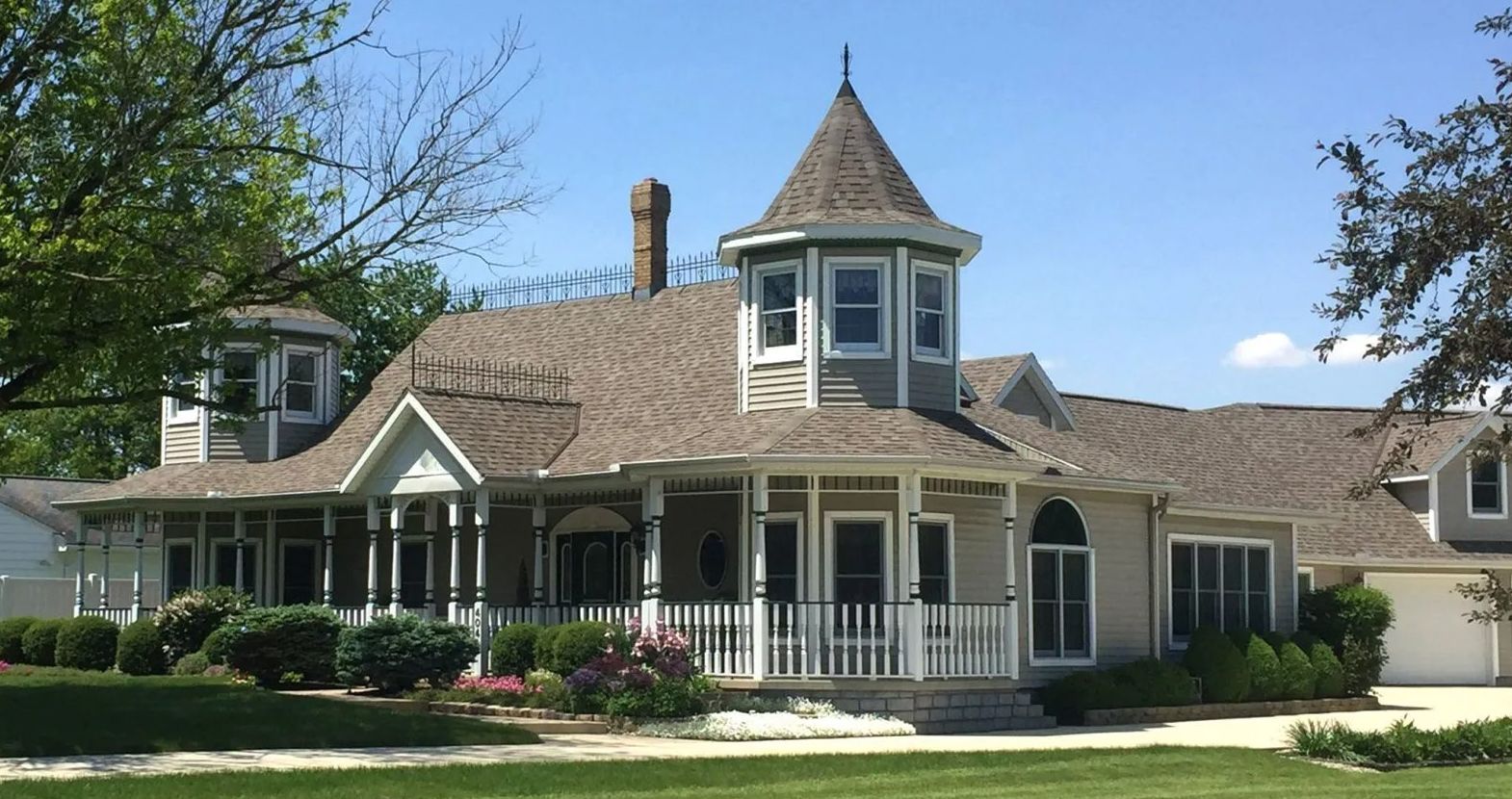 Victorian house with asphalt roofing