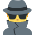 Person in a gray hat, dark coat, and yellow sunglasses with a raised collar covering the face.