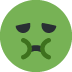 Green nauseated face emoji with furrowed brows and a frowning mouth