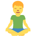 Person sitting cross-legged in a green shirt and yellow pants, holding a meditation pose on a white background