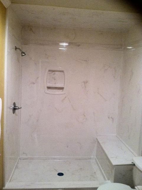 Cultured marble shower enclosure