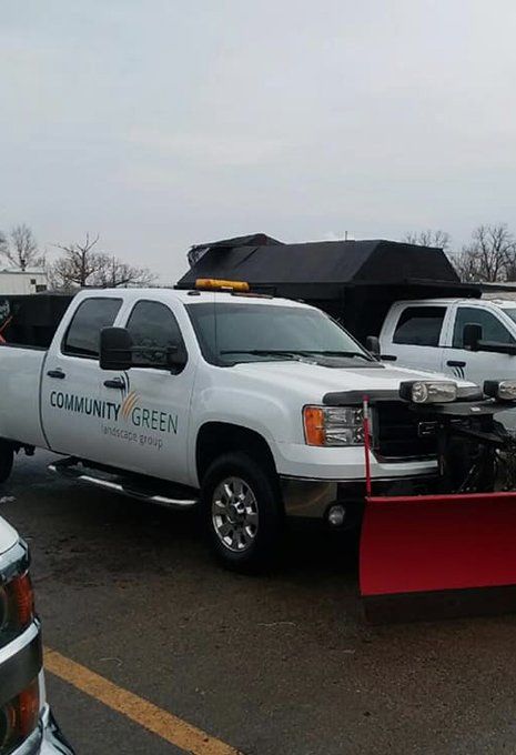 Community Green Landscape Group service trucks