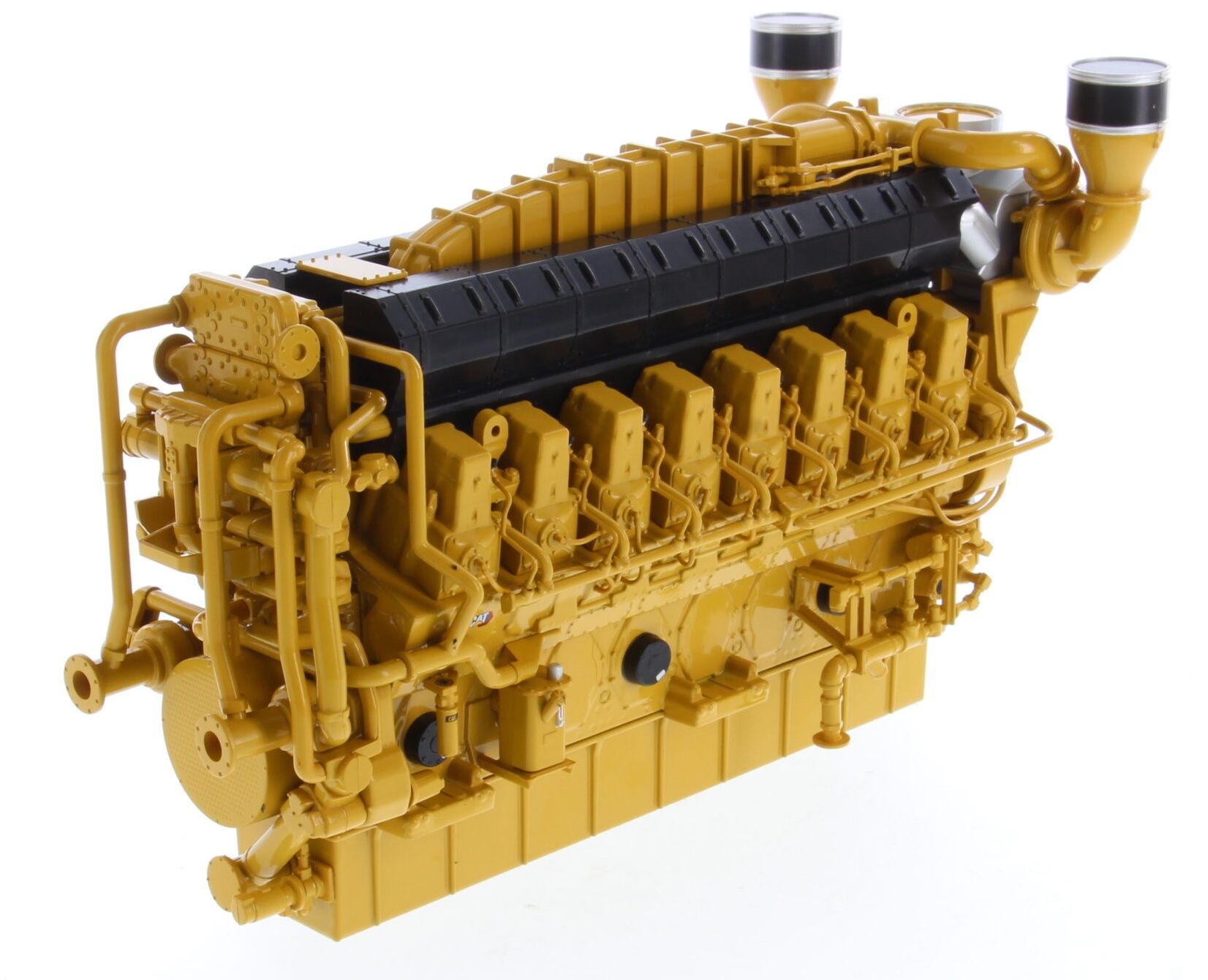 Yellow Caterpillar engine, detailed view.