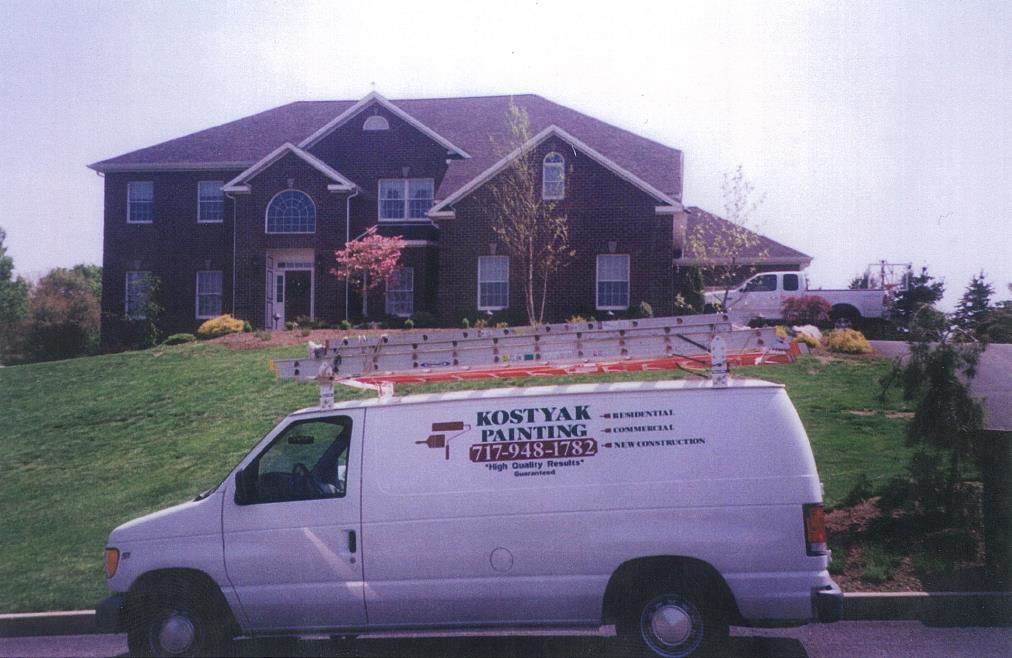 beautiful home with a car
