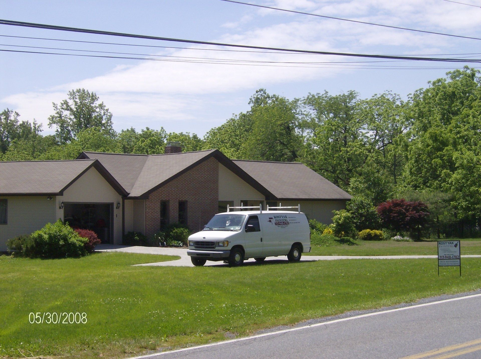 beautiful home with a car