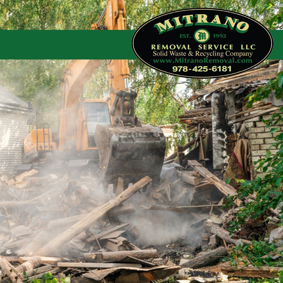 Excavator demolishing a building; Mitrano Removal Service logo.